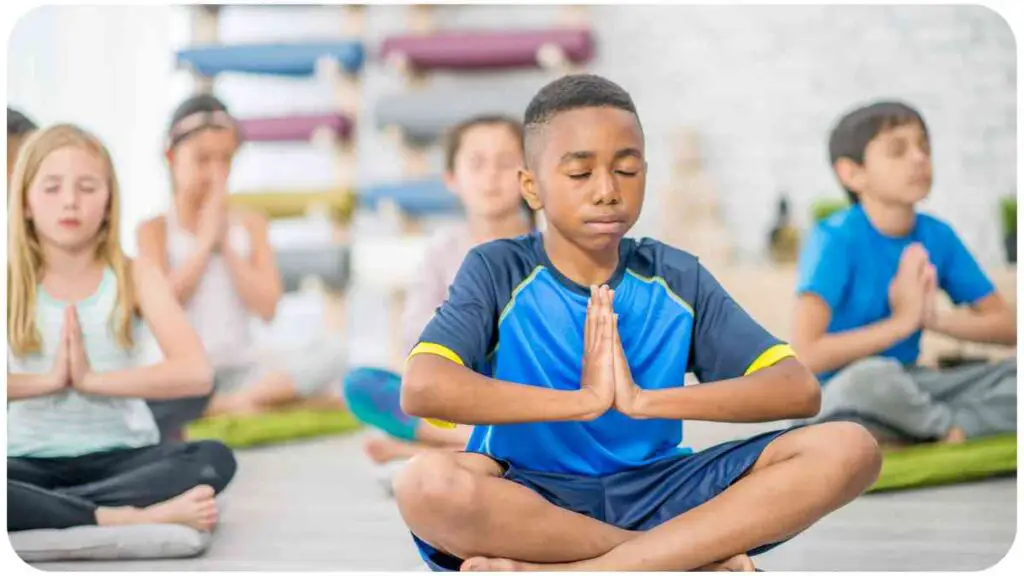 a group of people doing yoga in a room