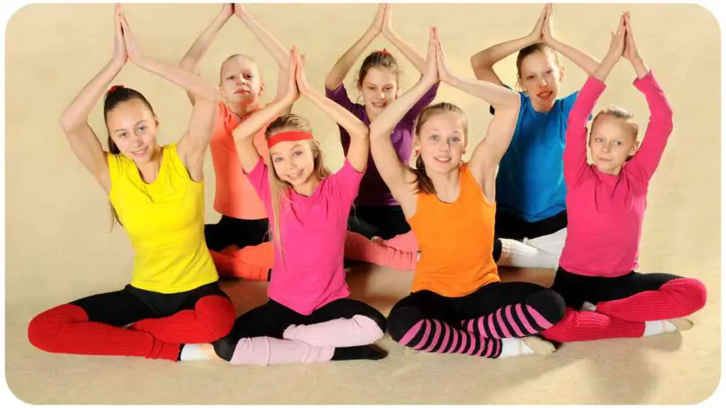 a group of individuals doing yoga poses