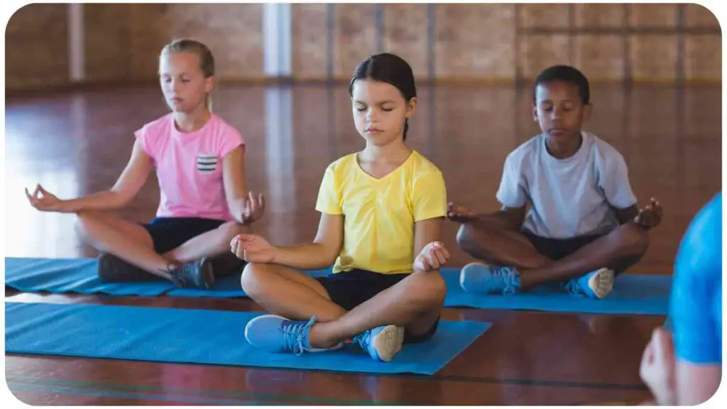 a group of individuals meditating in a yoga class