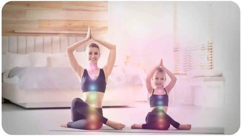 a parent and child doing yoga in a bedroom